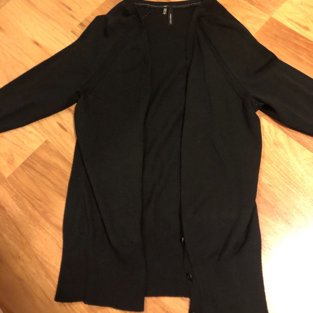 Maurice s black cardigan